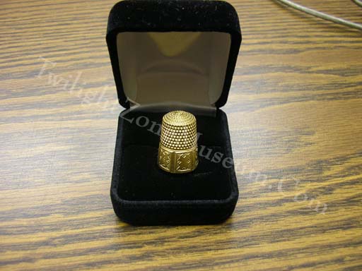 Marsha White's Gold Thimble
